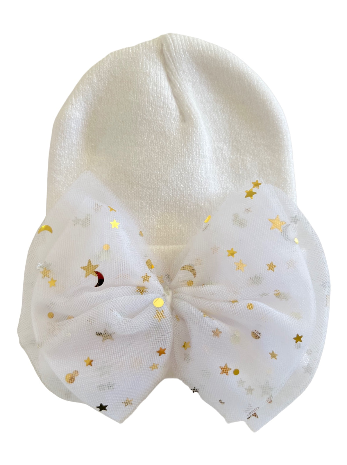 White knit hat adorned with a large, sparkly white bow featuring gold stars and moons.