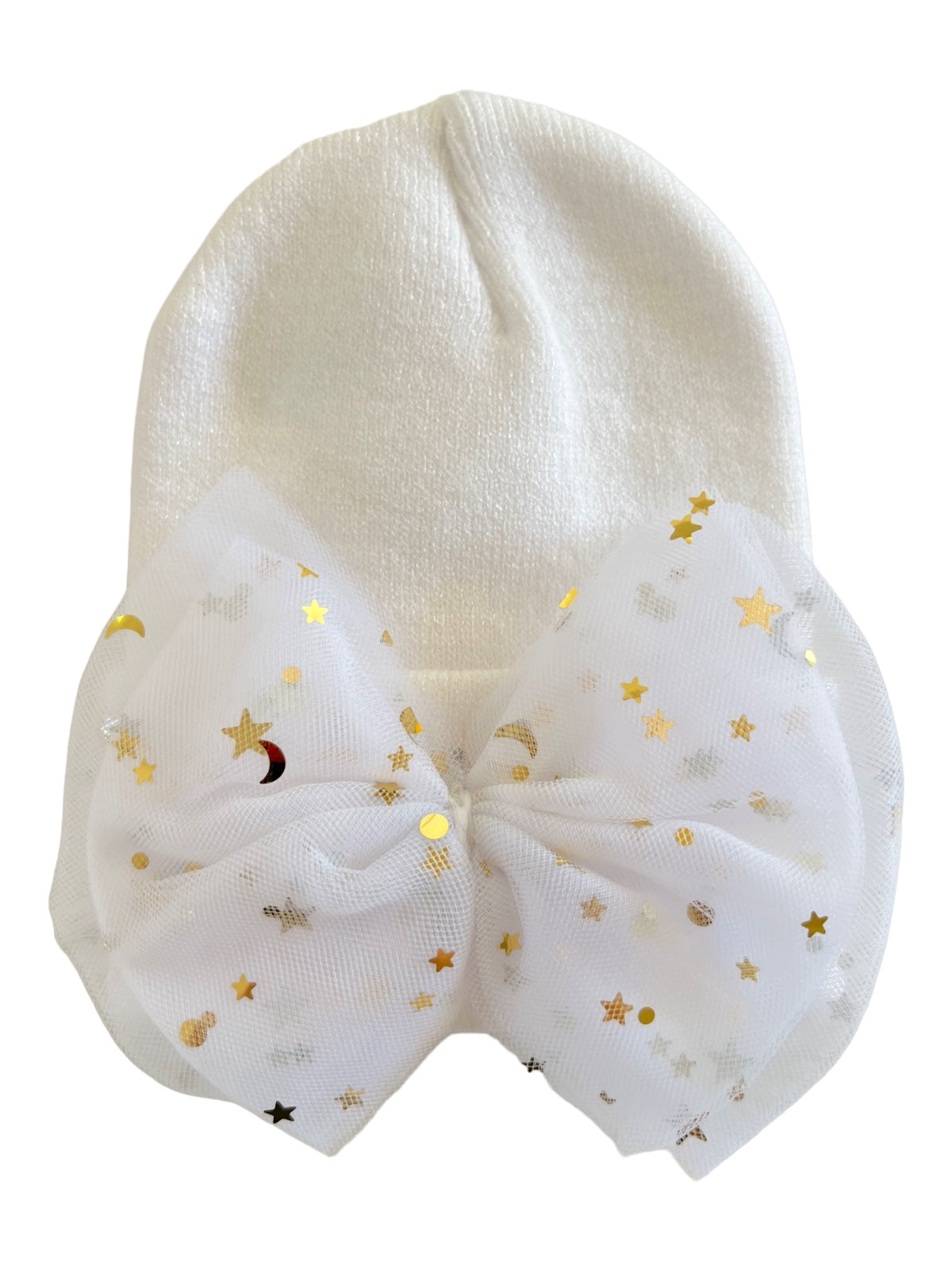 White knit hat adorned with a large, sparkly white bow featuring gold stars and moons.