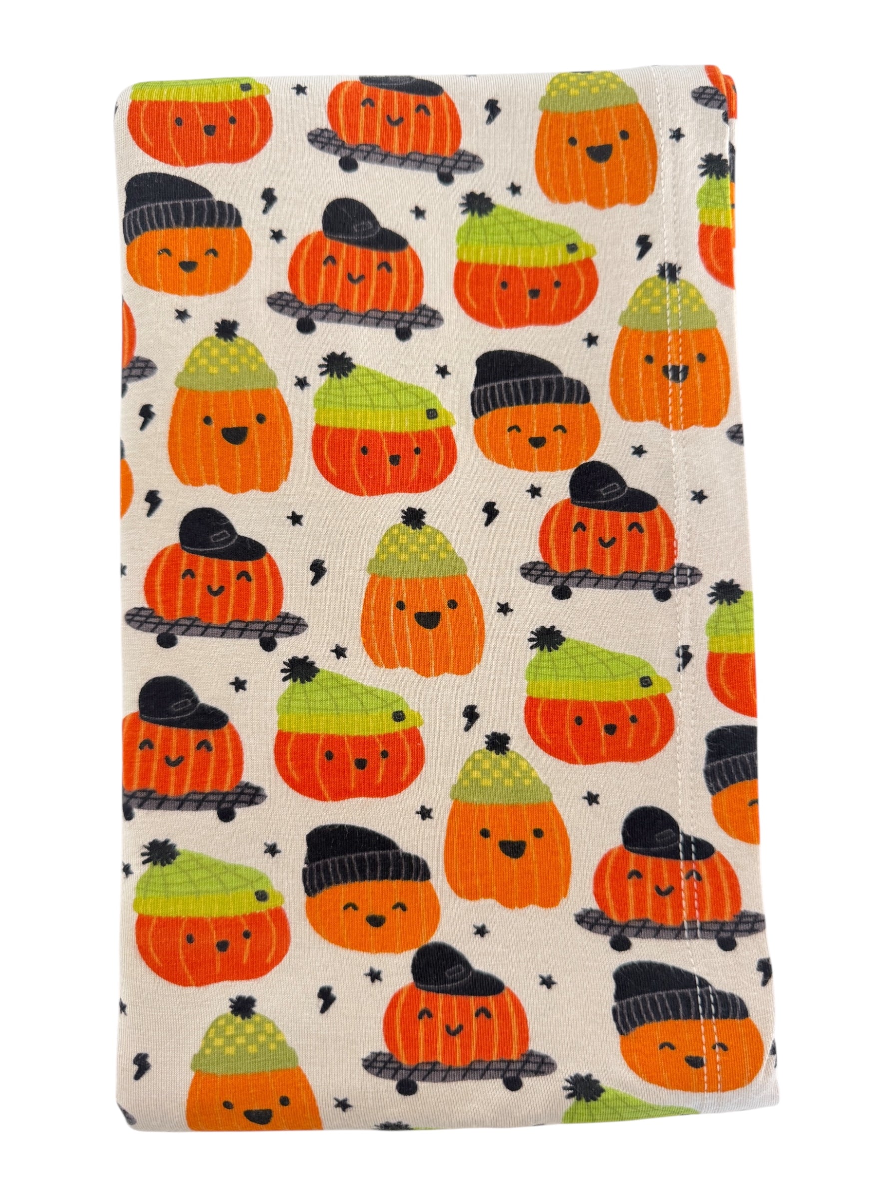 Smiling pumpkins in hats on a light background, perfect for autumn decor or festive events.