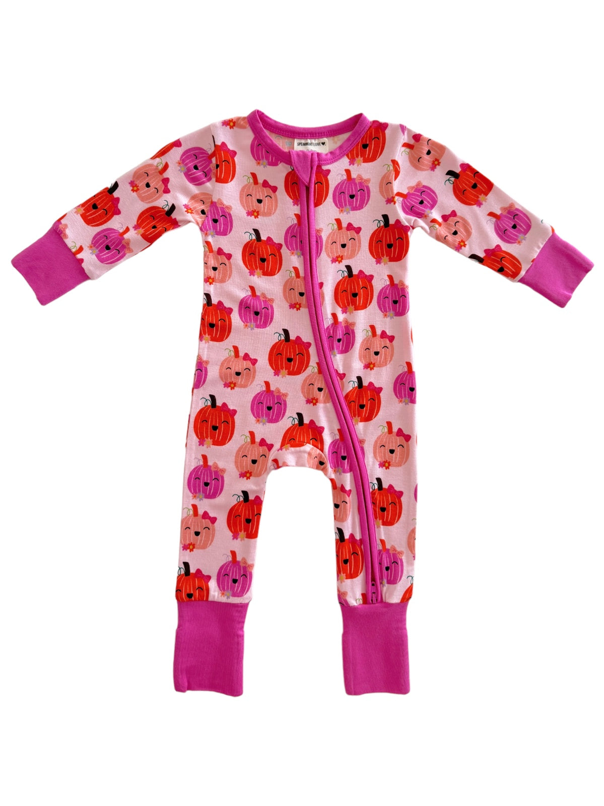 Pink onesie with pumpkin and ghost patterns, featuring long sleeves and a front zipper closure.