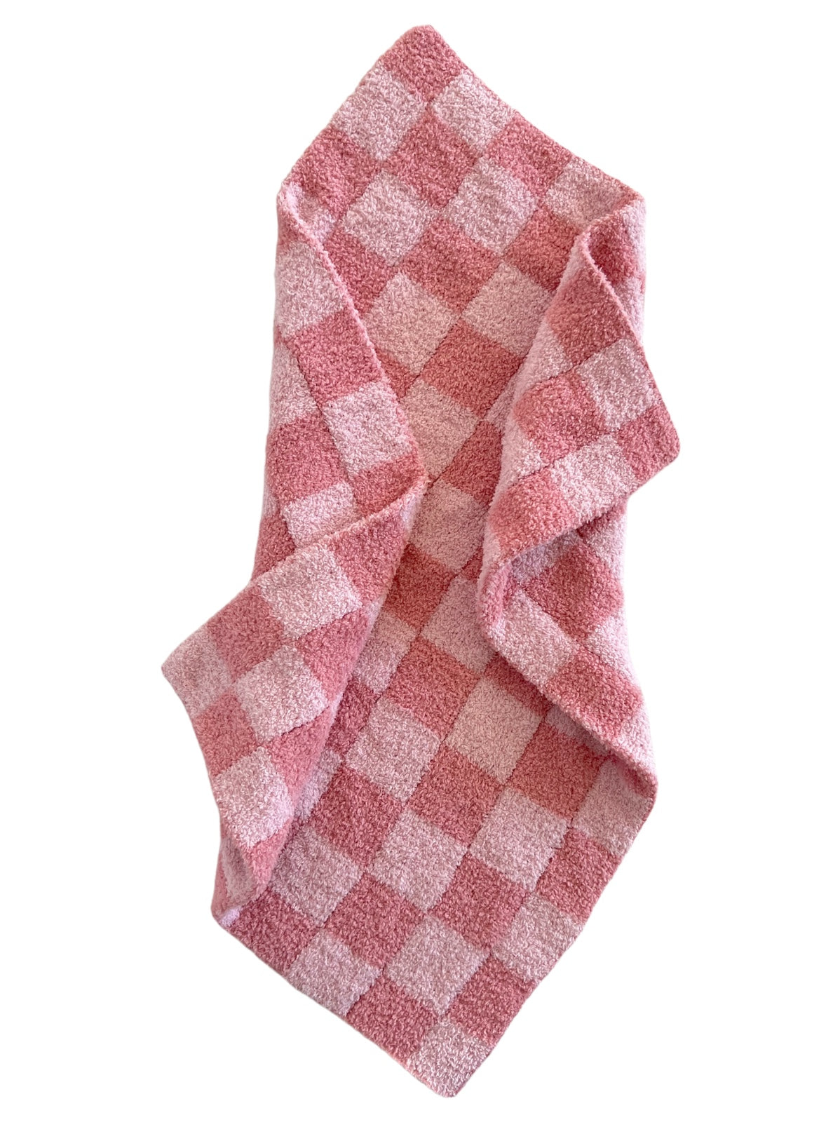 Pink checkered towel draped, featuring a soft texture and alternating light and dark pink squares.
