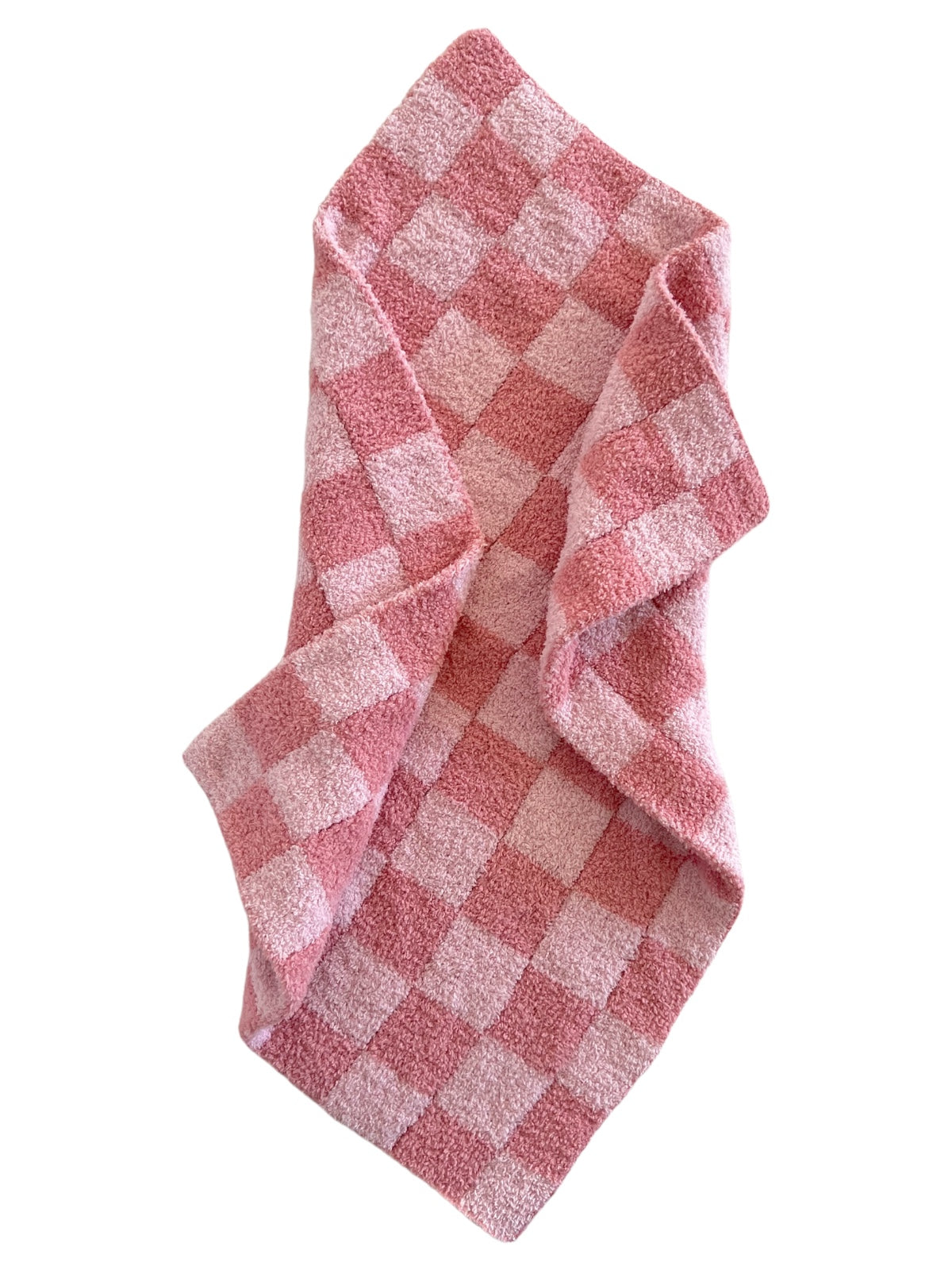 Pink checkered towel draped, featuring a soft texture and alternating light and dark pink squares.