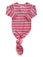 Pink baby onesie with red heart patterns and knot detailing at the bottom. Ideal for baby wear.