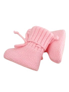 Pink knitted baby booties with a ribbed cuff and drawstring detail.