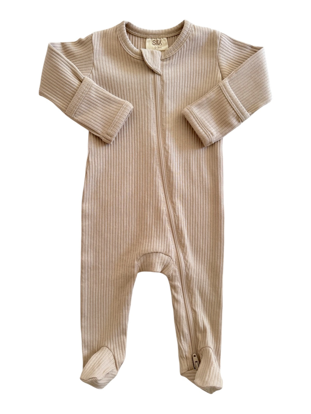 Beige ribbed baby onesie with long sleeves and zipper front, perfect for comfortable infant wear.