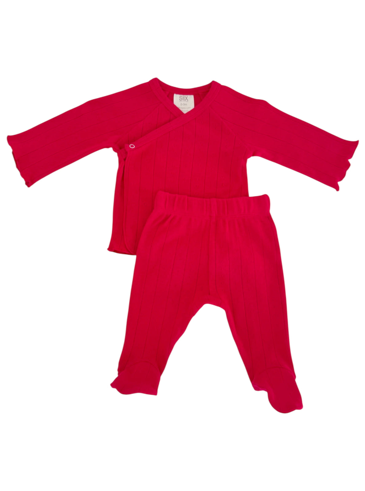 Bright pink baby outfit including a wrap-style top and matching pants, featuring ribbed texture and flared cuffs.