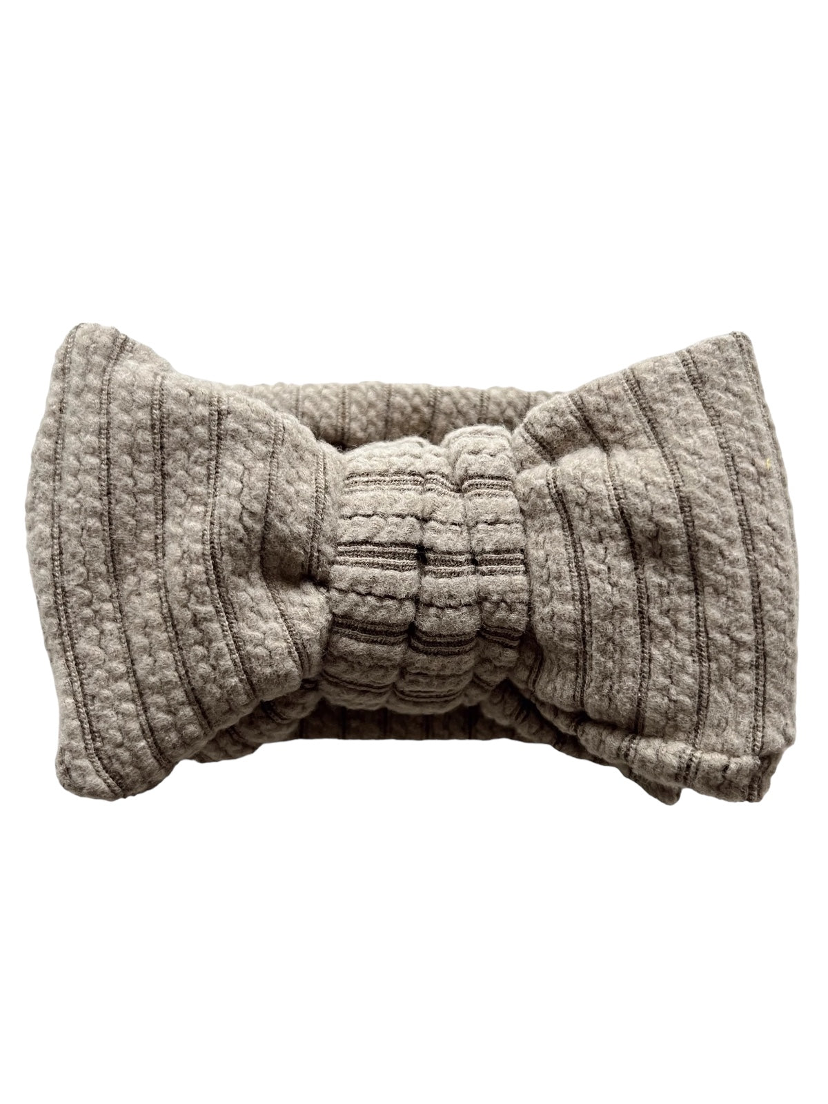Gray textured hairband with a bow design, featuring vertical stripes and elastic backing for a snug fit.