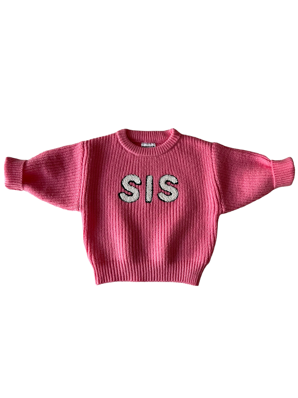 Pink sweater with ribbed texture and "SIS" lettering in white on the front.