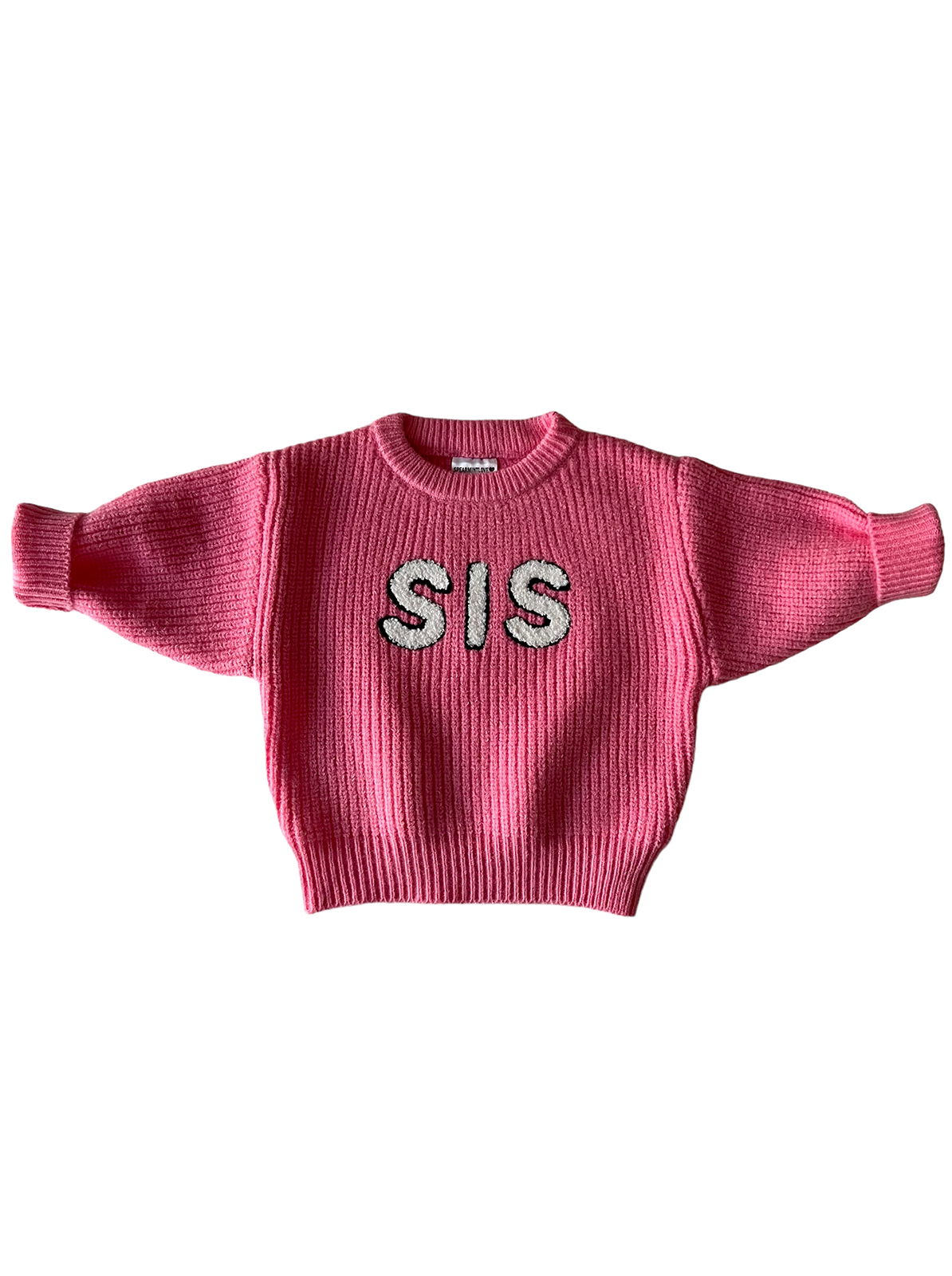 Pink sweater with ribbed texture and "SIS" lettering in white on the front.