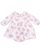 Floral baby dress with long sleeves and a Peter Pan collar, featuring a white background with pink flowers.