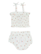 Light blue two-piece set featuring a ruffled crop top and matching bottoms with a floral pattern.