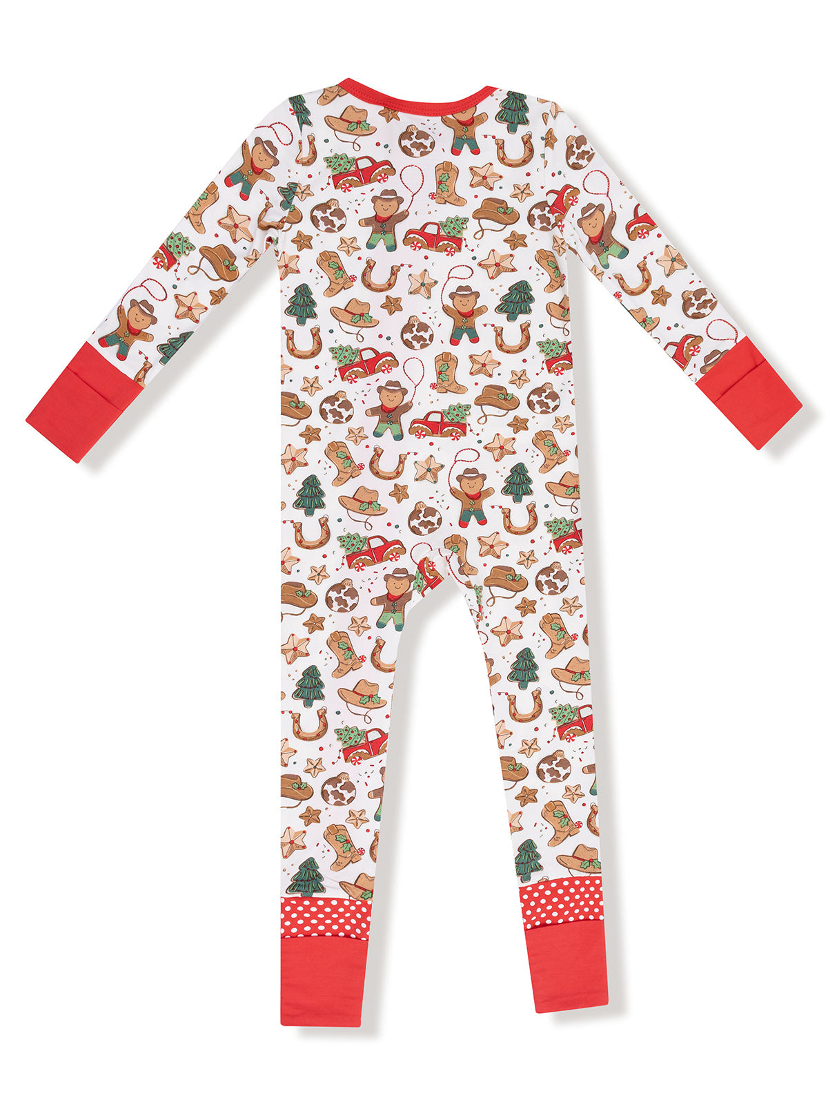 Toddler pajamas in festive print with gingerbread men, animals, and holiday motifs. Red accents on sleeves and cuffs.