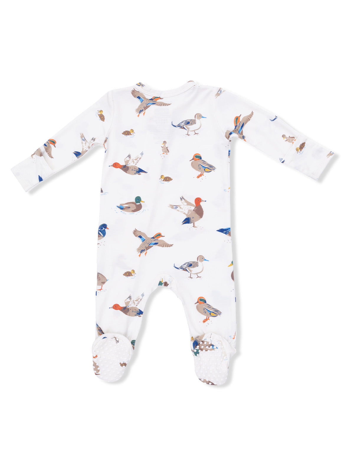 White baby onesie with colorful duck prints and textured grips on the feet.