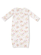 White nightgown with pastel animal and floral prints, featuring long sleeves and a ruffled neckline.