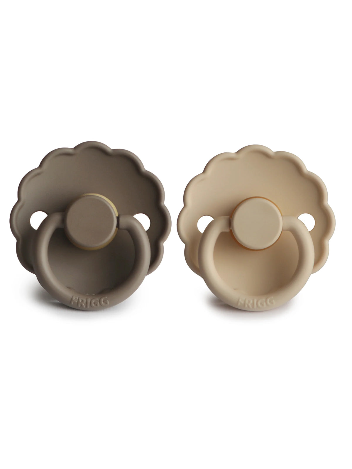 Two silicone pacifiers in taupe and beige, featuring a scalloped design for a modern look.
