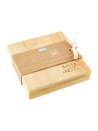 Wooden ultrasound announcement box with "Guess what..." text, tied with a ribbon, ideal for sharing baby news.