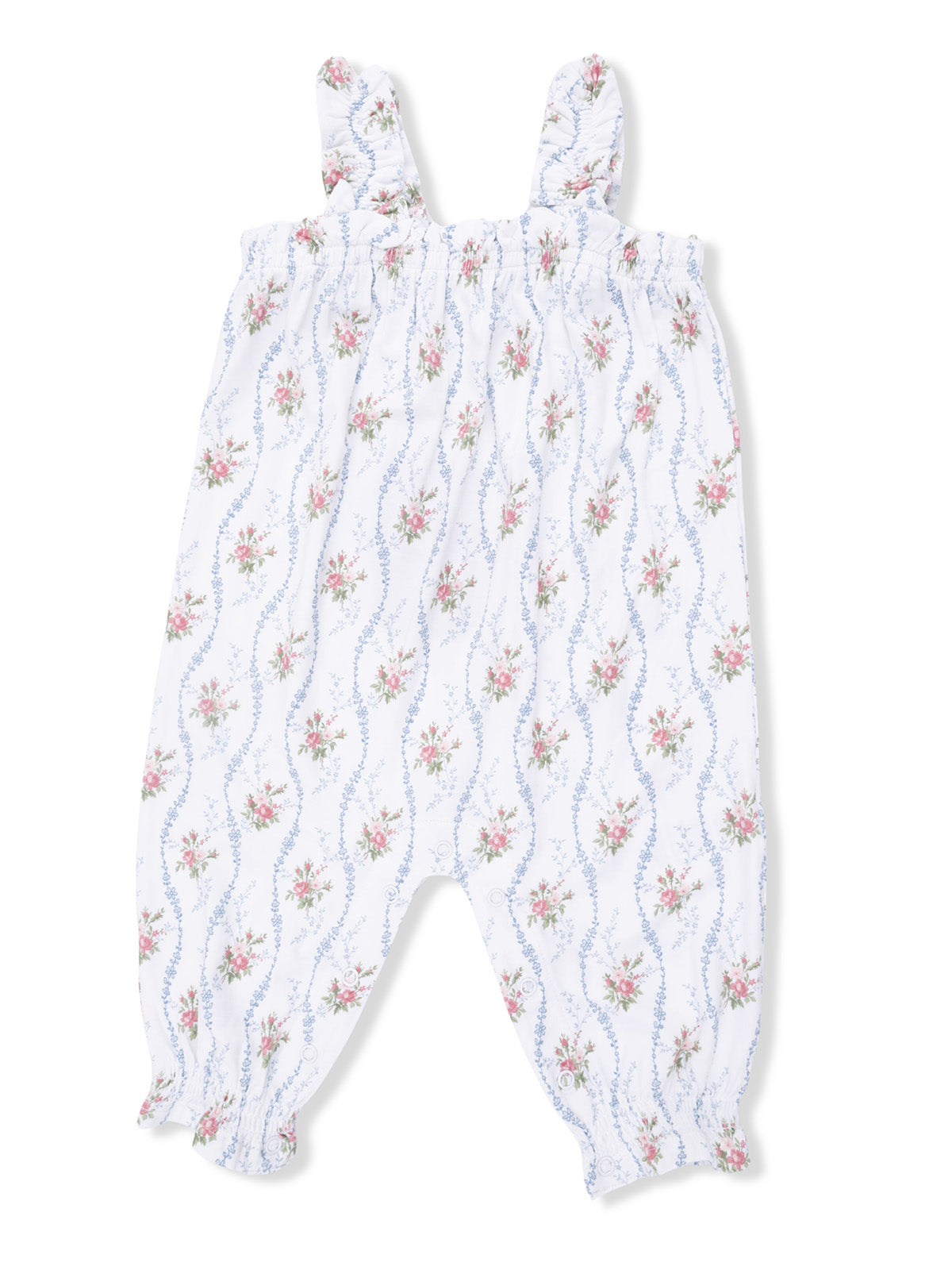 White floral romper with blue and pink flowers, featuring smocked bodice and ruffled straps. Perfect for warm weather.
