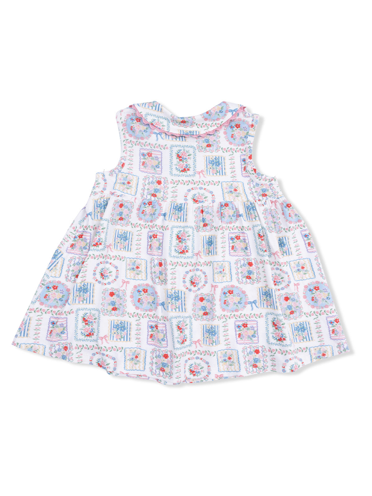 Floral-patterned sleeveless dress with a ruffled neckline, featuring colorful squares and flowers on a white background.