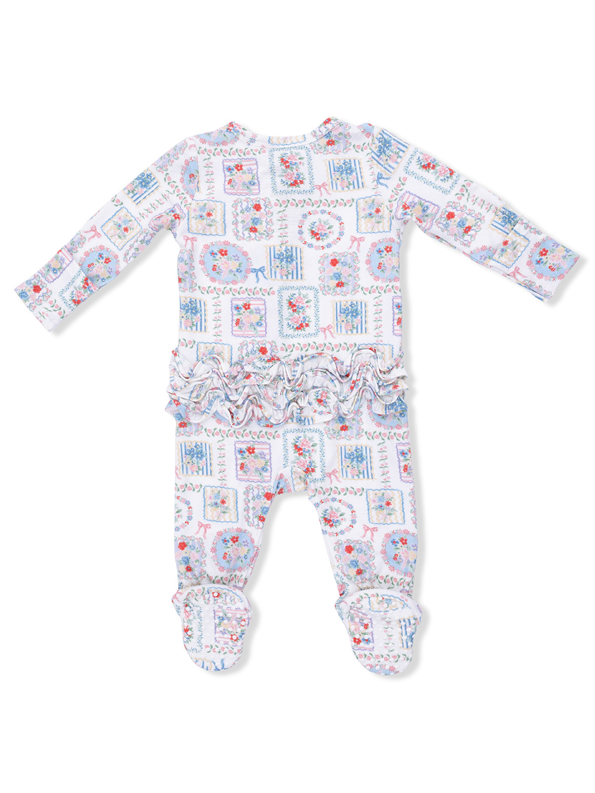 Baby onesie with long sleeves, floral patchwork design, ruffle trim at the waist, and footed bottom.