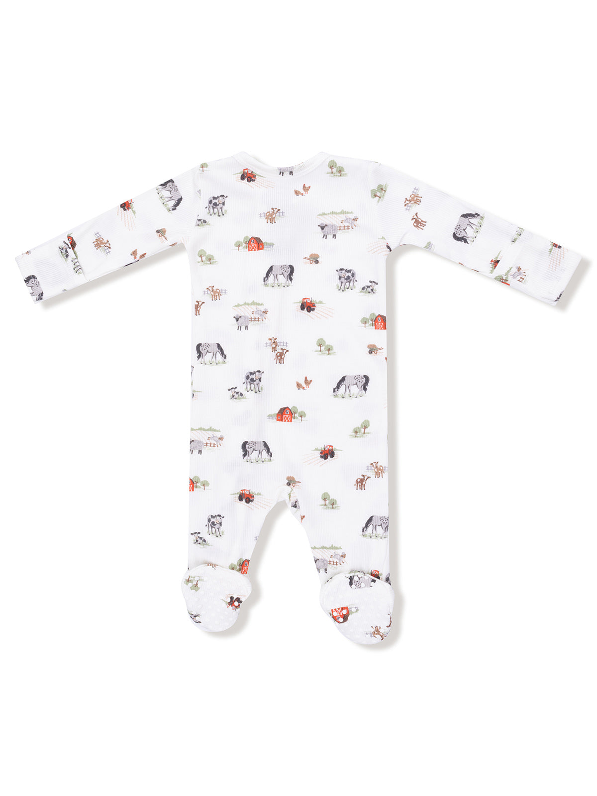 White baby onesie with farm animal patterns, featuring cows, barns, and tractors, designed for comfort and play.