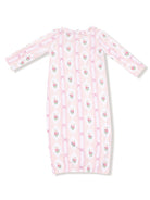 Pink floral nightgown with long sleeves and diamond pattern, featuring small bows and a ruffled neckline.