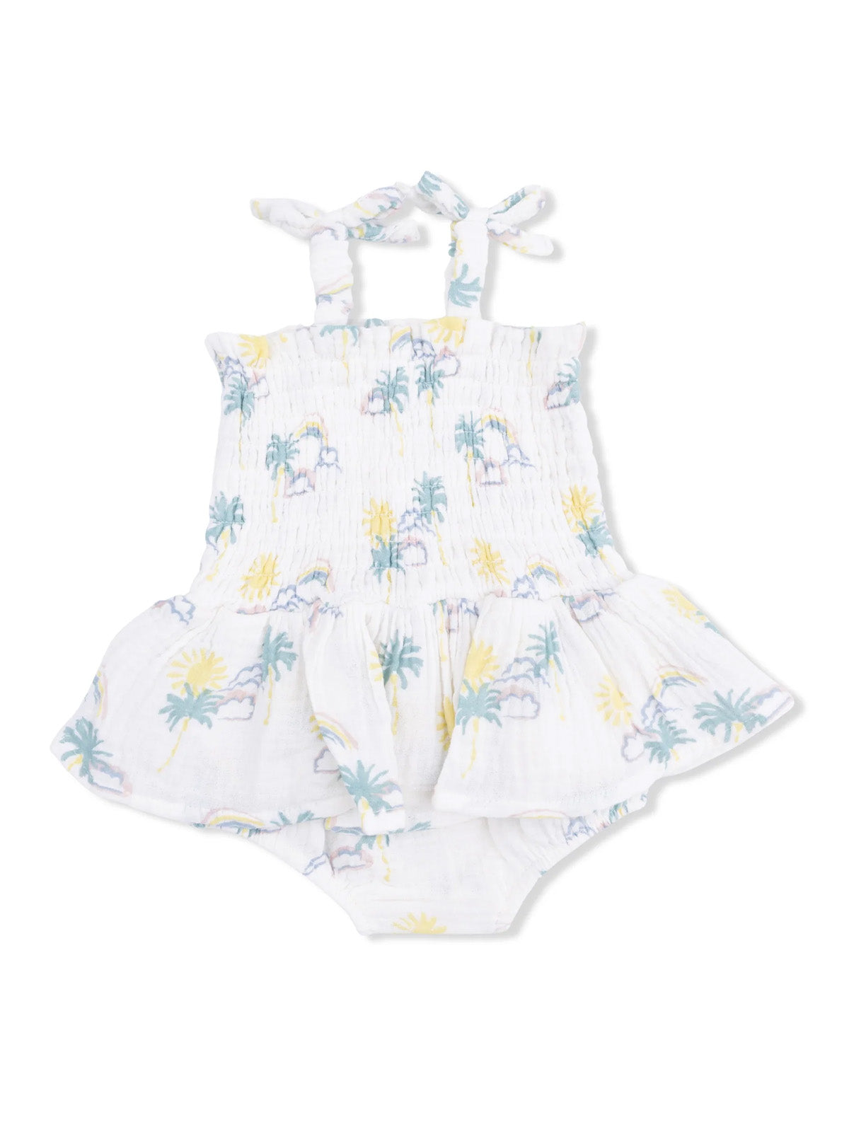 White patterned baby romper with palm trees and sun designs, featuring spaghetti straps and a flared skirt.