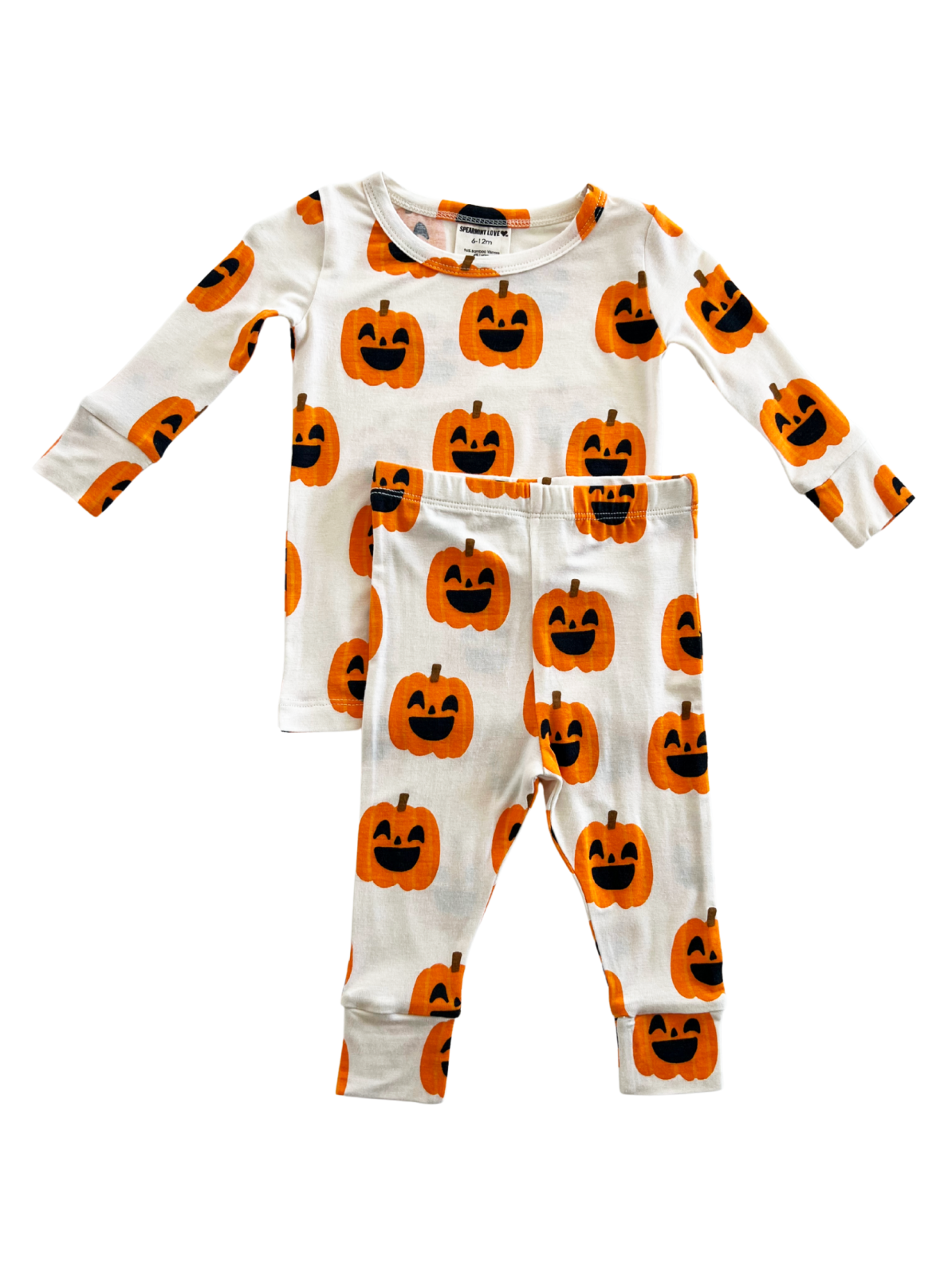 Children's pajamas with a fun pumpkin pattern in orange and black on a white background. Perfect for Halloween.
