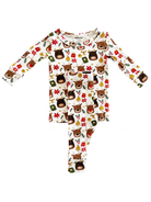 Children's festive pajamas featuring playful bear and holiday patterns in red, green, and gold on a white background.