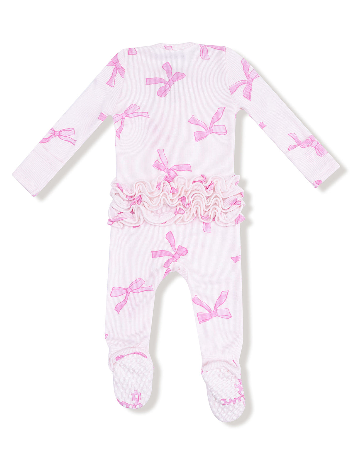 Pink bow-patterned baby onesie with ruffled waist and footed design, featuring long sleeves and soft fabric.