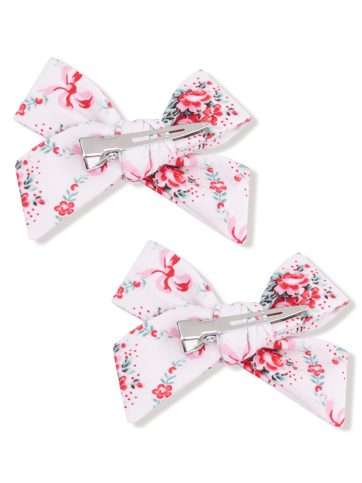 Two floral hair bows with clips, featuring a pink and white design with small flowers.