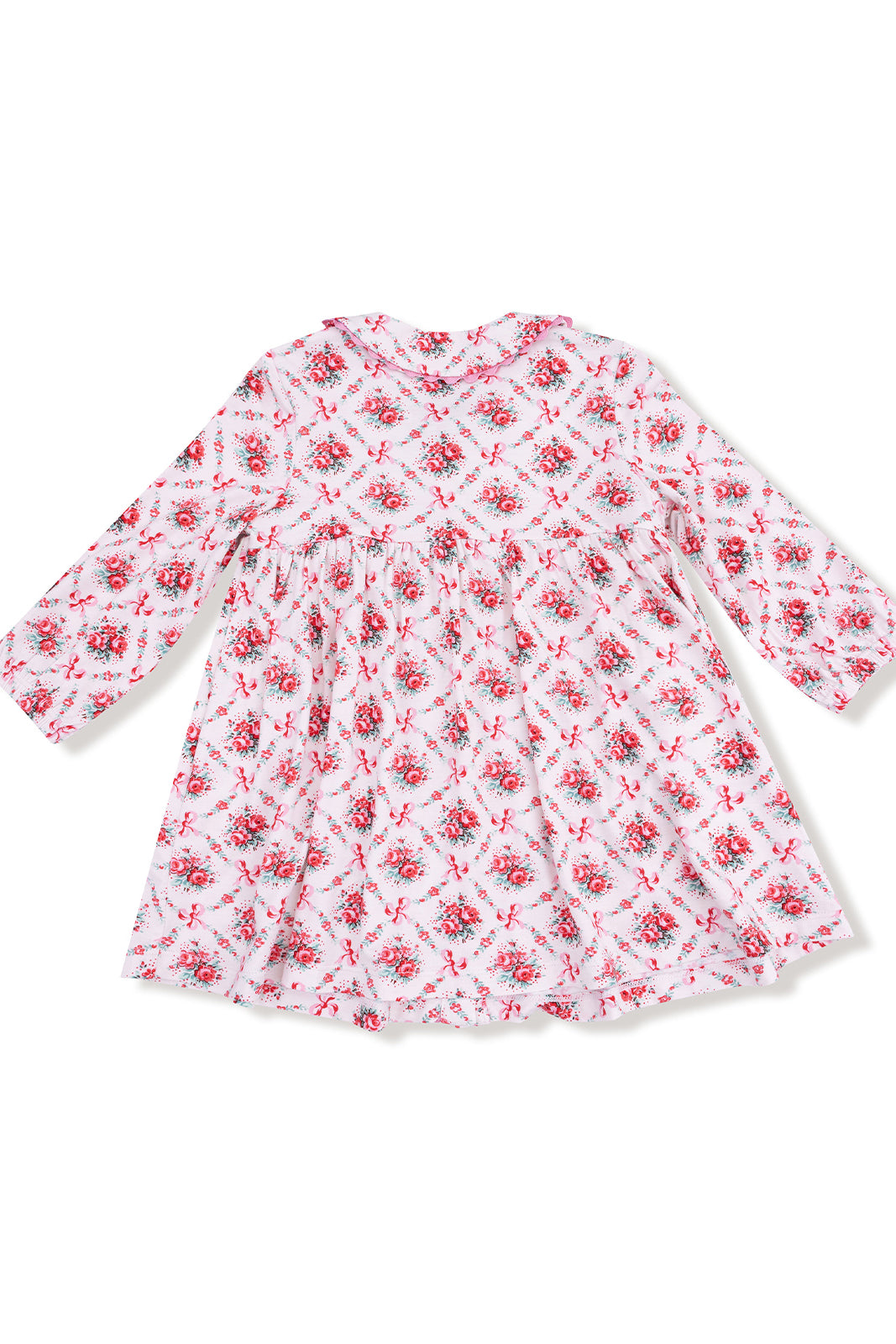 Long-sleeve white dress with red floral pattern and bows, featuring a gathered waist.