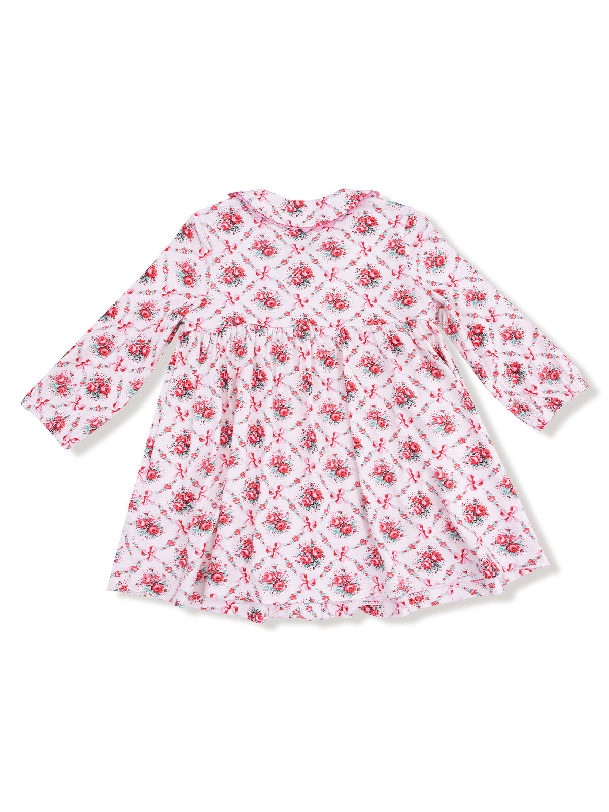 Long-sleeve white dress with red floral pattern and bows, featuring a gathered waist.