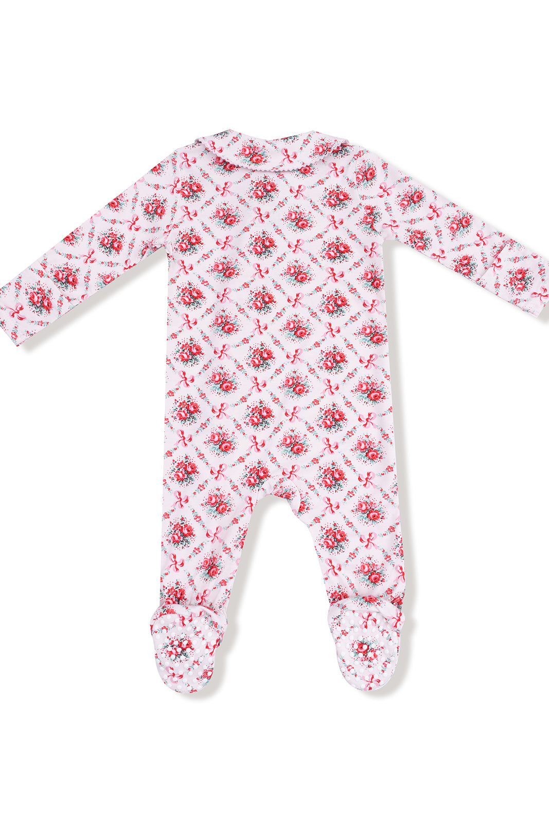 Back view of a floral patterned baby onesie with long sleeves and footed design.