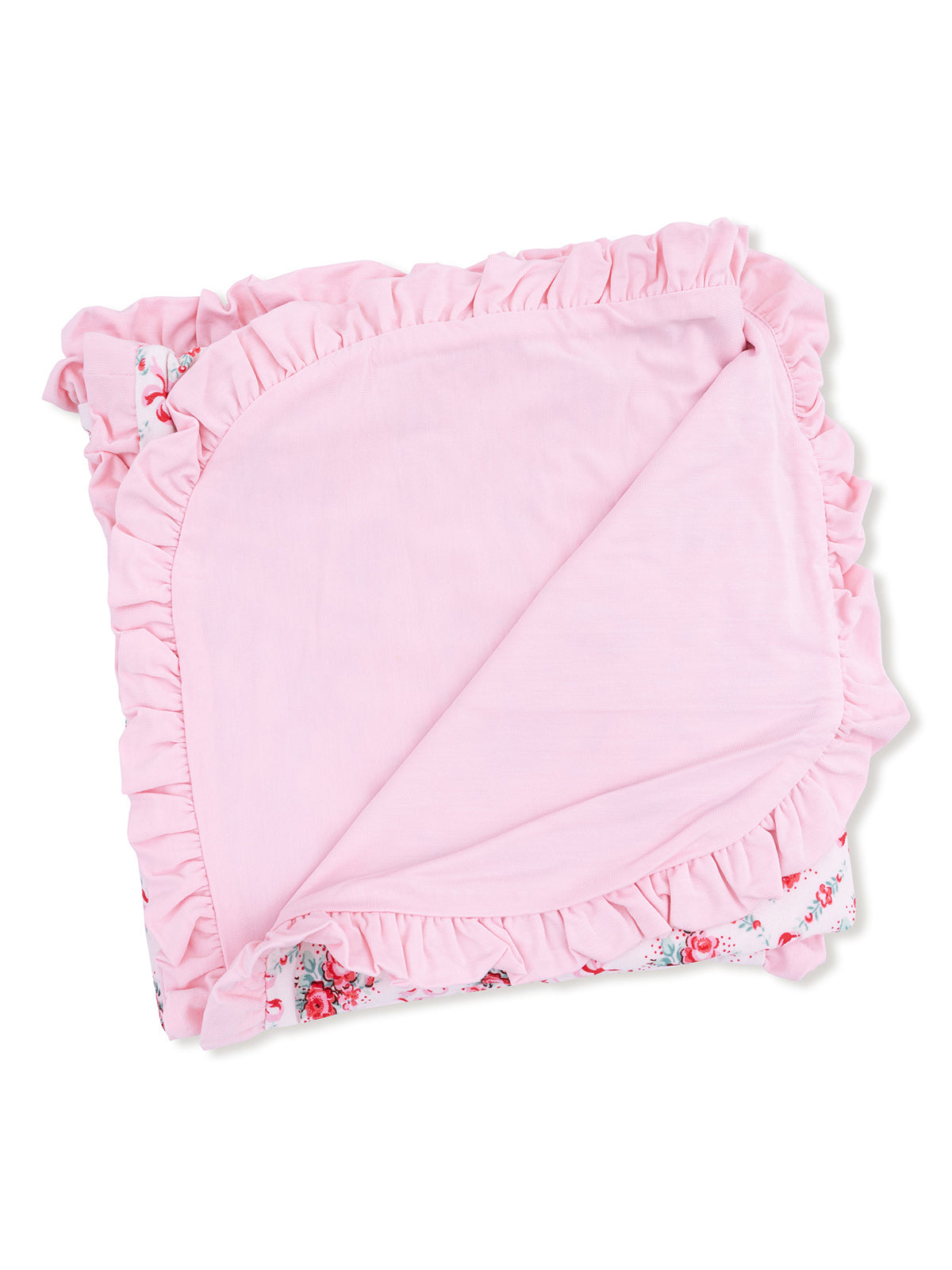 Pink blanket with floral prints and ruffled edges, folded neatly.