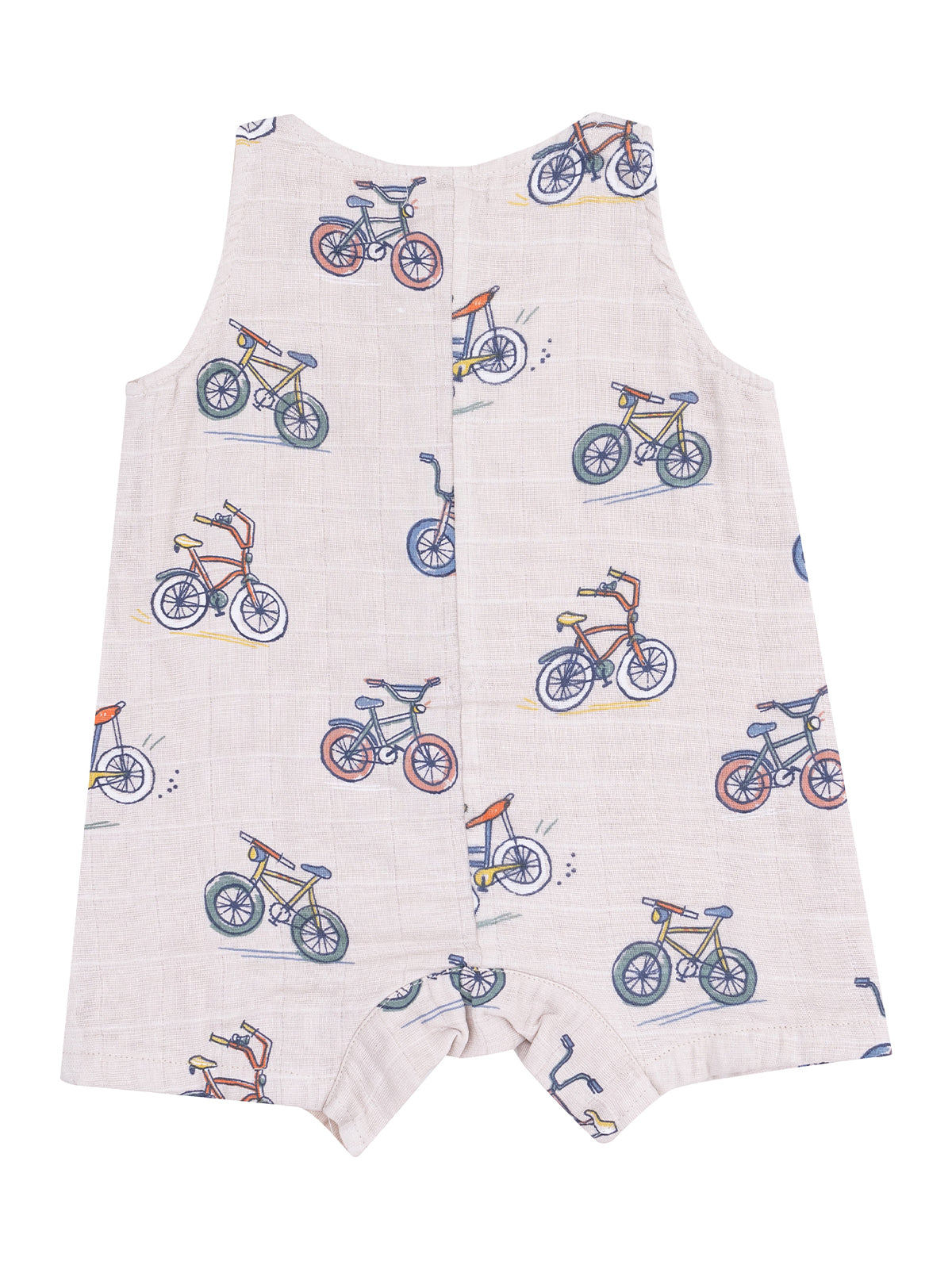Light-colored romper with bicycle prints on a textured background, featuring a button closure at the back.