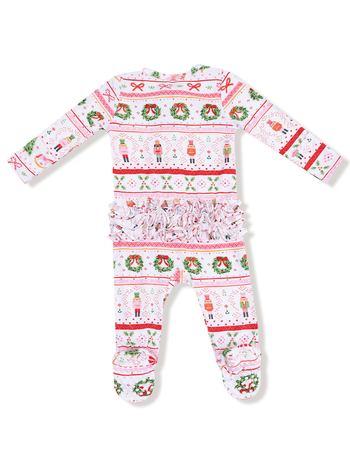 Holiday-themed baby onesie with nutcracker and wreath patterns, featuring ruffled back and footed design.