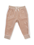 Beige toddler sweatpants with side pockets and a drawstring waist, featuring white side stripes.