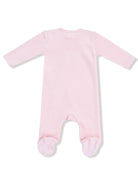 Light pink baby onesie with long sleeves and footies, viewed from the back.