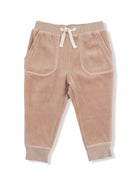 Light brown toddler sweatpants with pockets and drawstring, soft fleece material. Perfect for comfort and play.