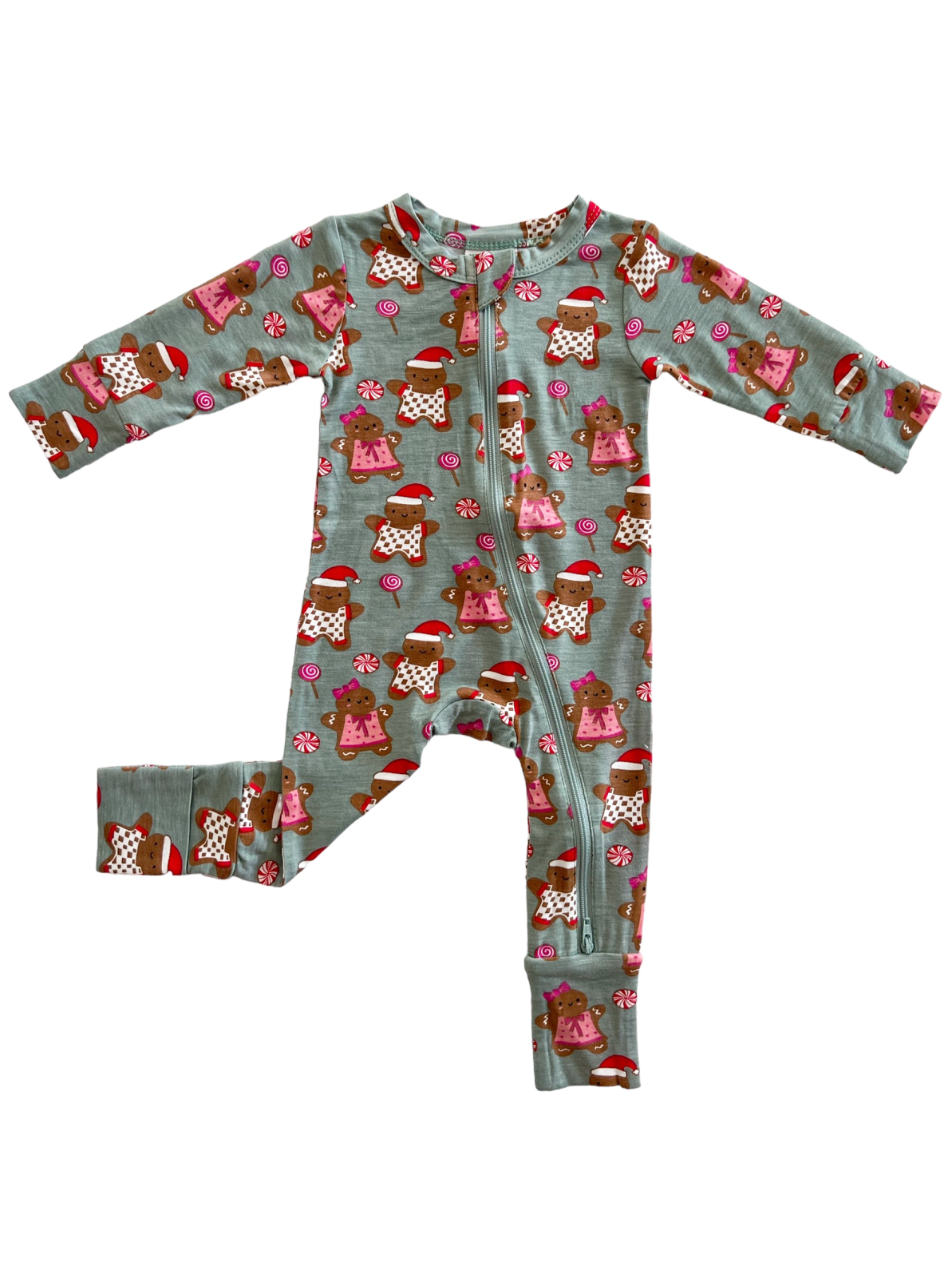 Child's festive pajama onesie with gingerbread and candy designs in gray. Long sleeves and a front zipper closure.