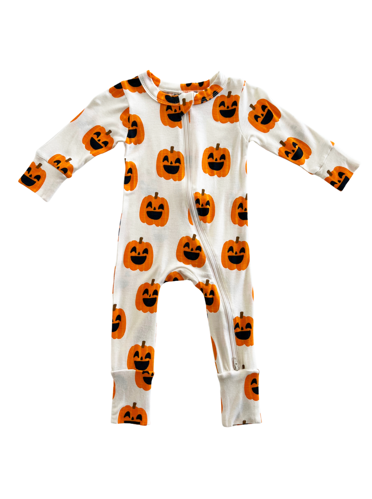 White onesie with pumpkin print in orange and black, featuring a front zipper and long sleeves. Perfect for Halloween!