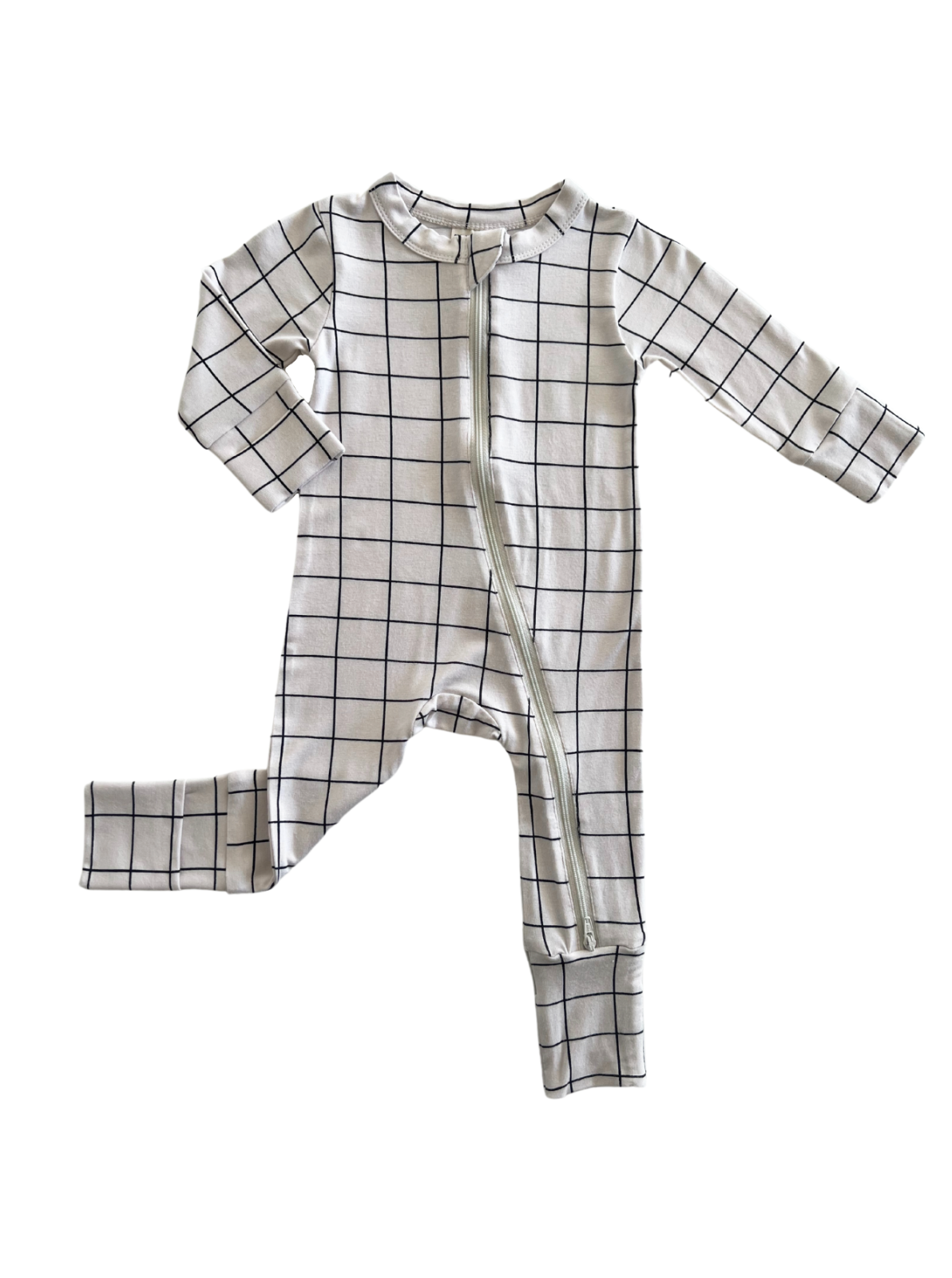 Light-colored baby onesie with black grid pattern and zipper front, featuring long sleeves and leg openings.