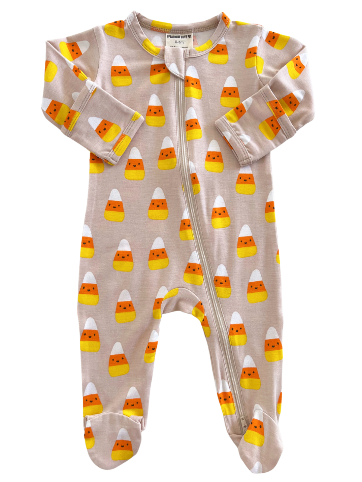 Toddler pajamas with a candy corn print, featuring a zip front and soft fabric in light colors.