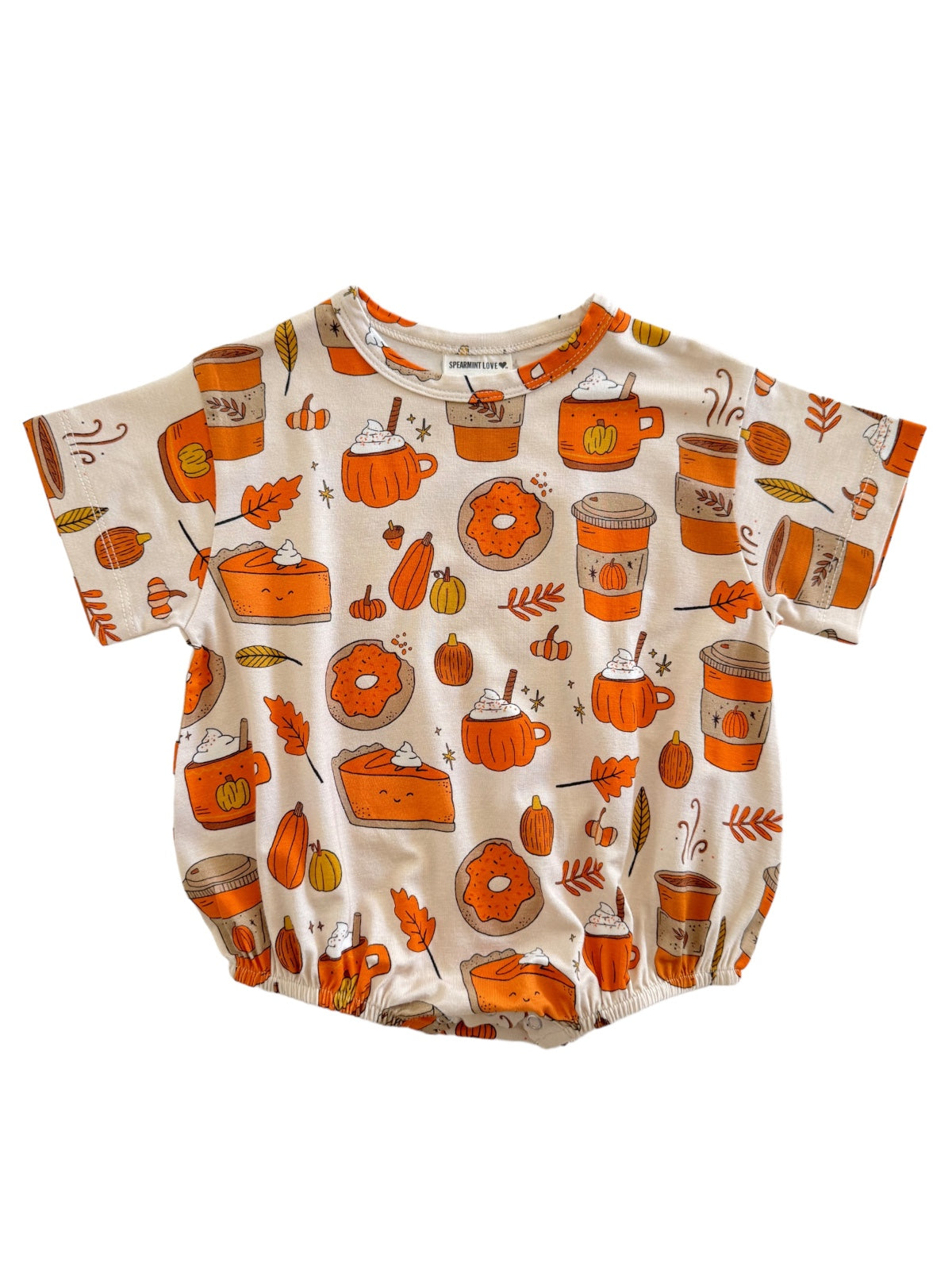 Pumpkin-themed toddler outfit featuring illustrations of pies, drinks, and autumn leaves in warm colors.