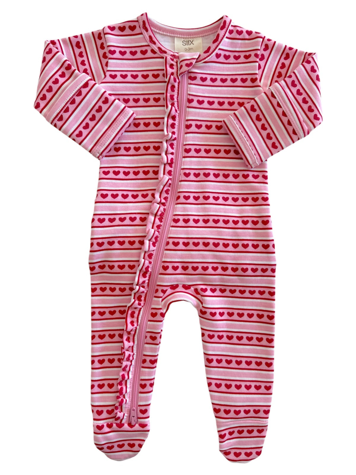 Pink baby onesie featuring heart patterns and a zippered front. Ideal for newborns up to 3 months.