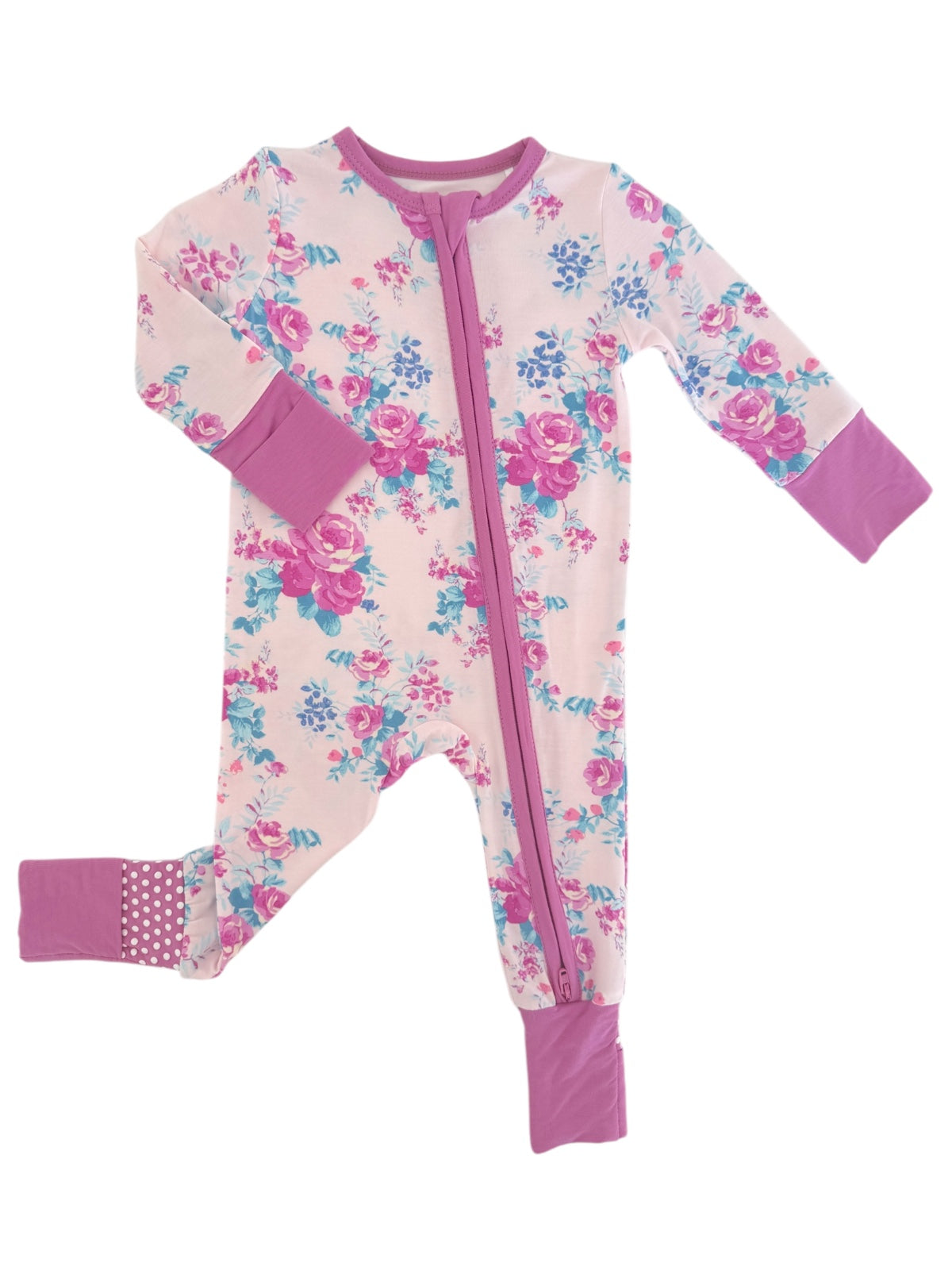 Floral-patterned infant pajamas with a front zipper and purple accents on sleeves and feet.