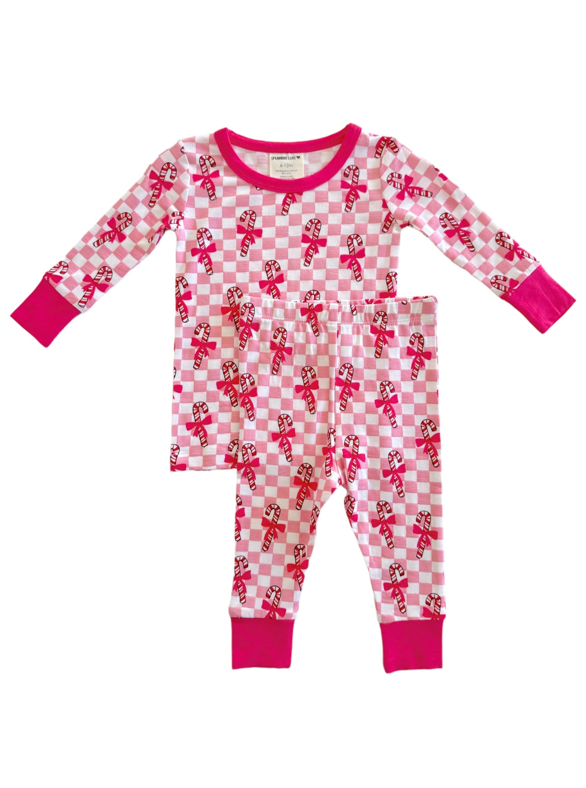 Pink and white checkered pajama set with candy cane patterns, featuring long sleeves and matching pants.
