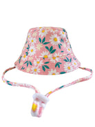 Pink bucket hat with white daisies and green leaves, featuring a matching adjustable chin strap.