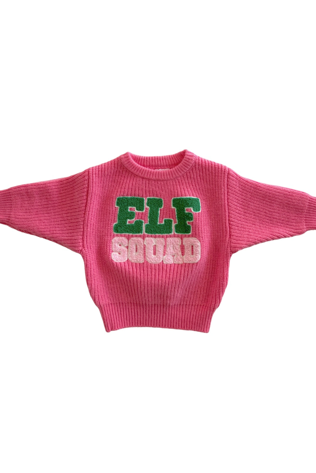 Pink sweater featuring the text "ELF SQUAD" in green and white letters. Perfect for holiday festivities.