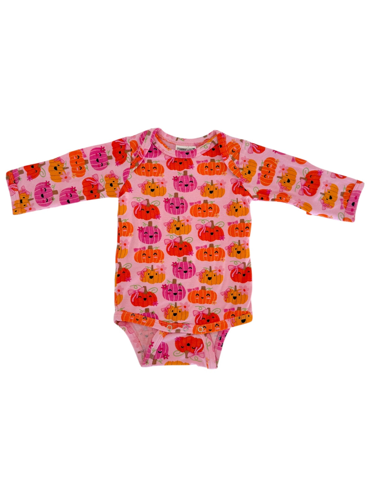 Pink long-sleeve onesie with colorful pumpkin prints for infants. Perfect for fall and Halloween celebrations.
